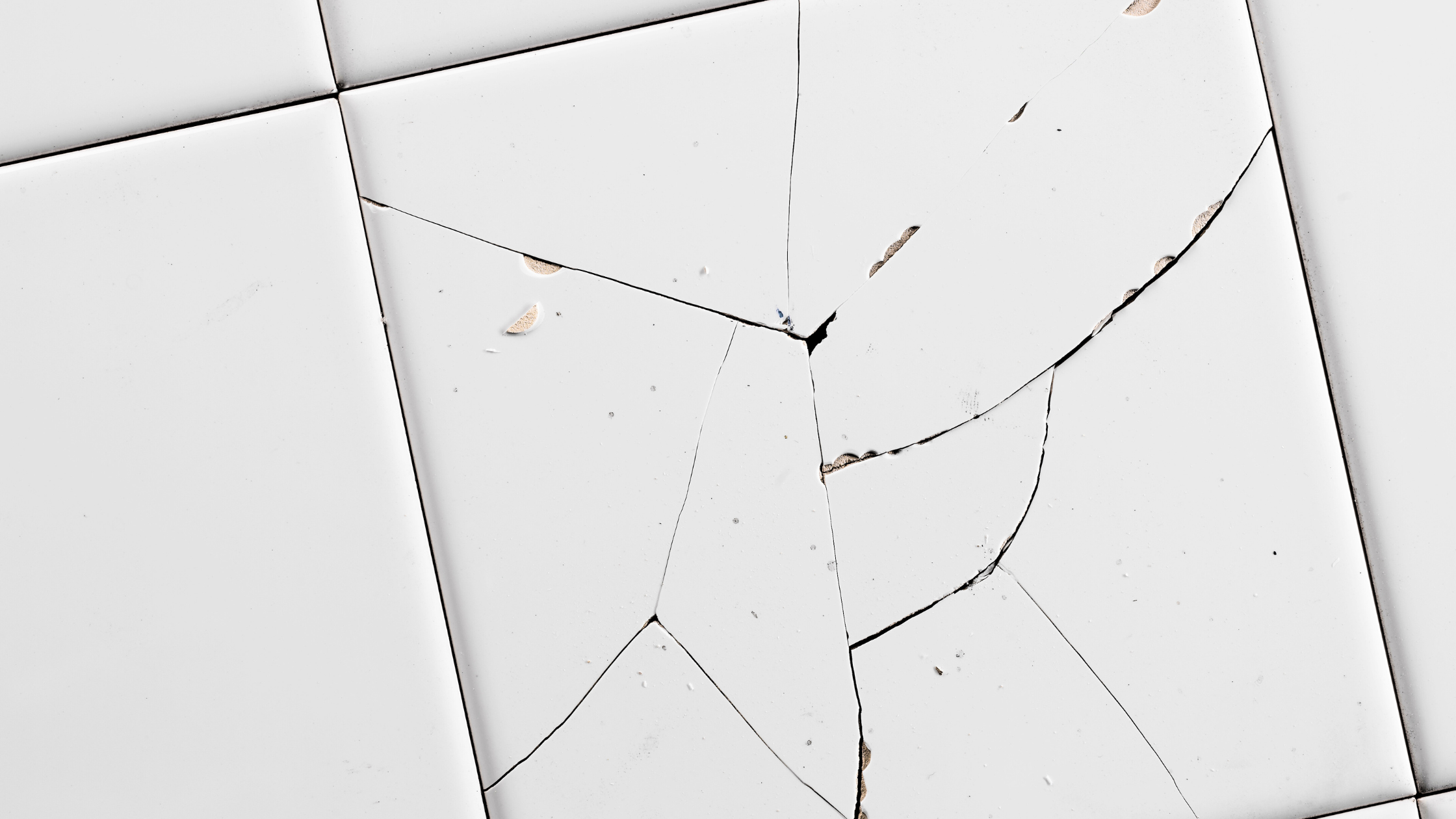 Hollow tiles showing improper installation and potential cracking issues